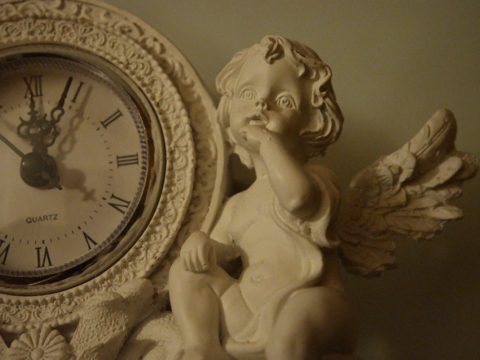 "Rococo clock" by Fæ is licensed under CC BY 2.0