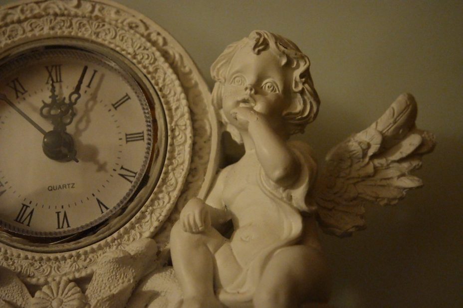 "Rococo clock" by Fæ is licensed under CC BY 2.0